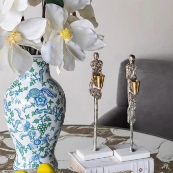 شمعدان معدن فضي بقاعده رخامي بتصميم مودرن متوفر شكلين7483 شمعدان معدن فضي بقاعده رخامي بتصميم مودرن متوفر شكلين7483