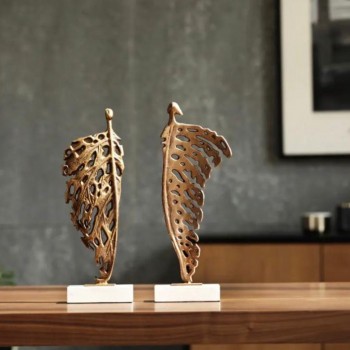 تحفه معدن كلاسيك بتصميم ورق شجر بقاعده رخام متوفر شكلين -L5082