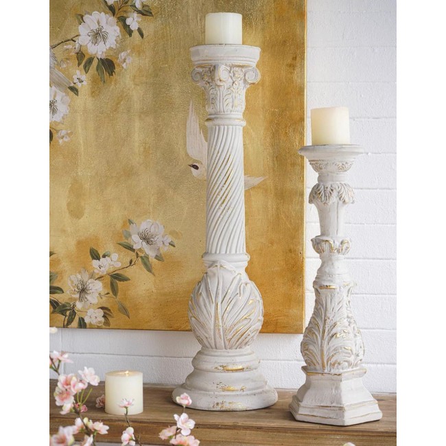 شمعدان يجمع بين فخامة الاعمده ونعومة زخارف النباتيه متوفر بحجمين وشكلين مختلفين L8544