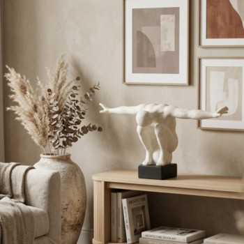 تحفه فنيه تجريدياً يجسد القوة والرشاقة في آنٍ واحدمع أذرع ممدودة توحي بالتوازن والتحليقL8562