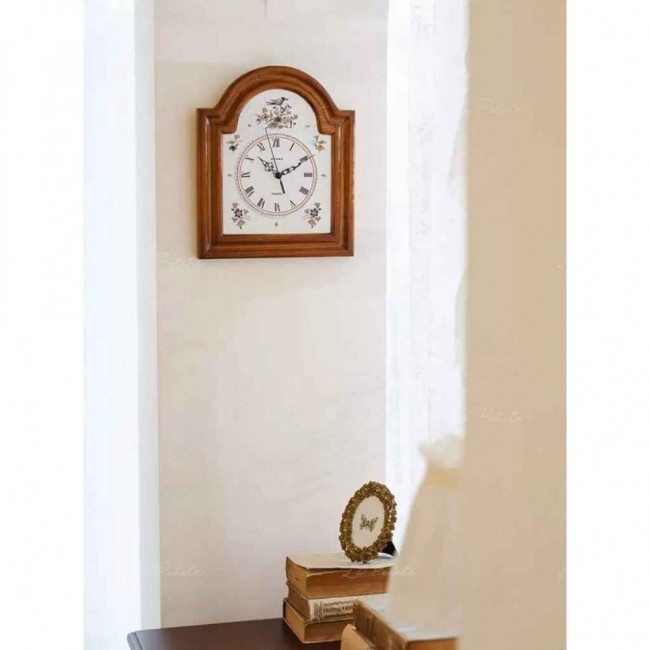 ساعه جداريه بطراز كلاسيك بنقوش ريفيه 9184