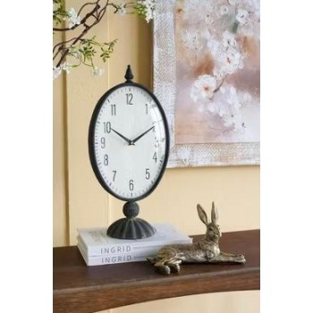 ساعه طاوله بيضاوية سوداء عتيقة ذات وجه أبيض وقاعدة عموديةL8616