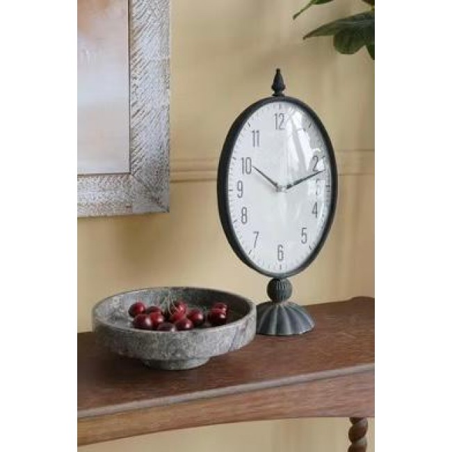 ساعه طاوله بيضاوية سوداء عتيقة ذات وجه أبيض وقاعدة عموديةL8616